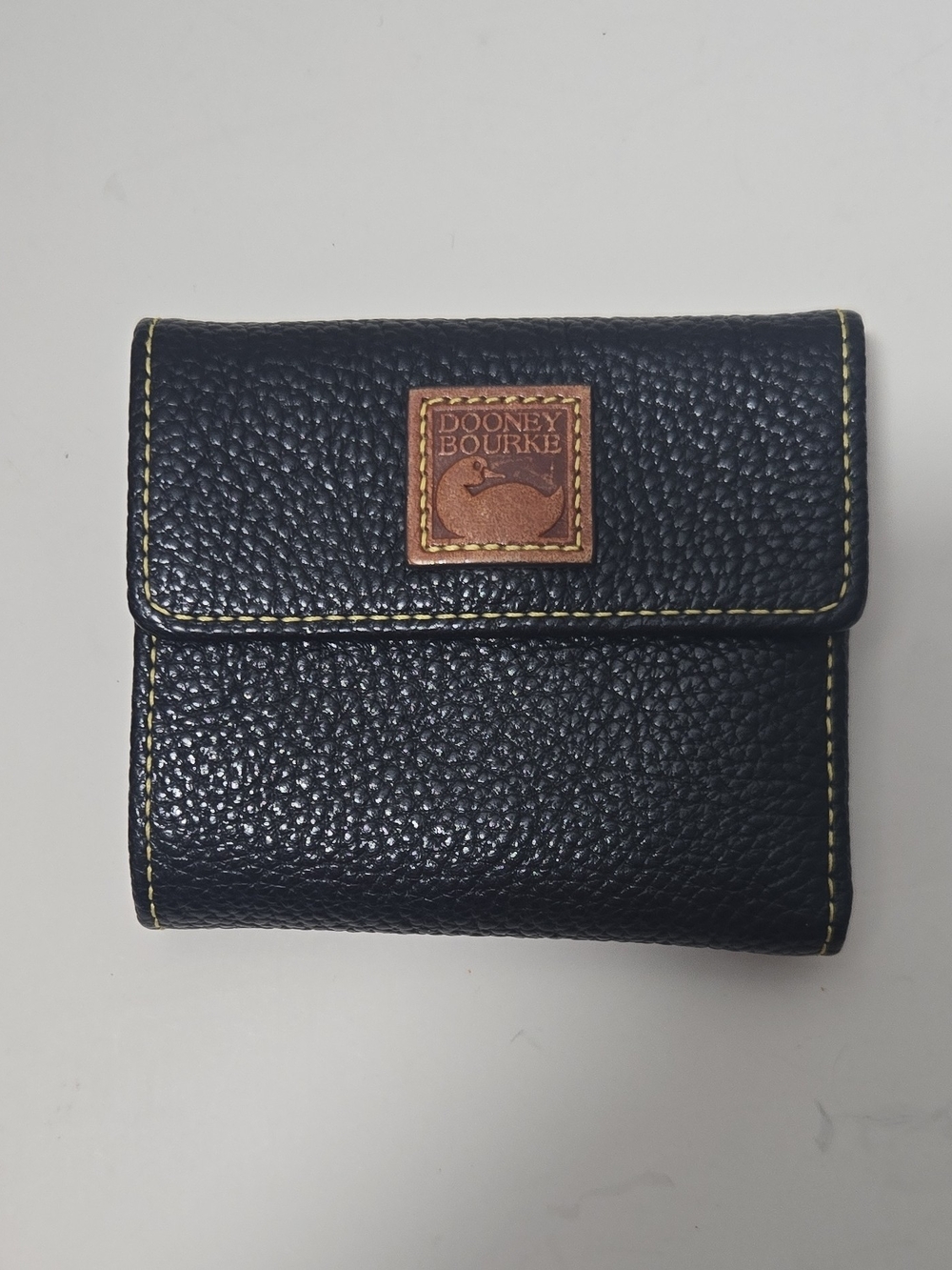 Dooney & Bourke Black Pebbled Leather Wallet with Tan Logo